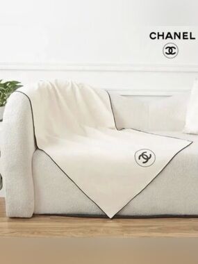 Ivory Throw with Black Emblem